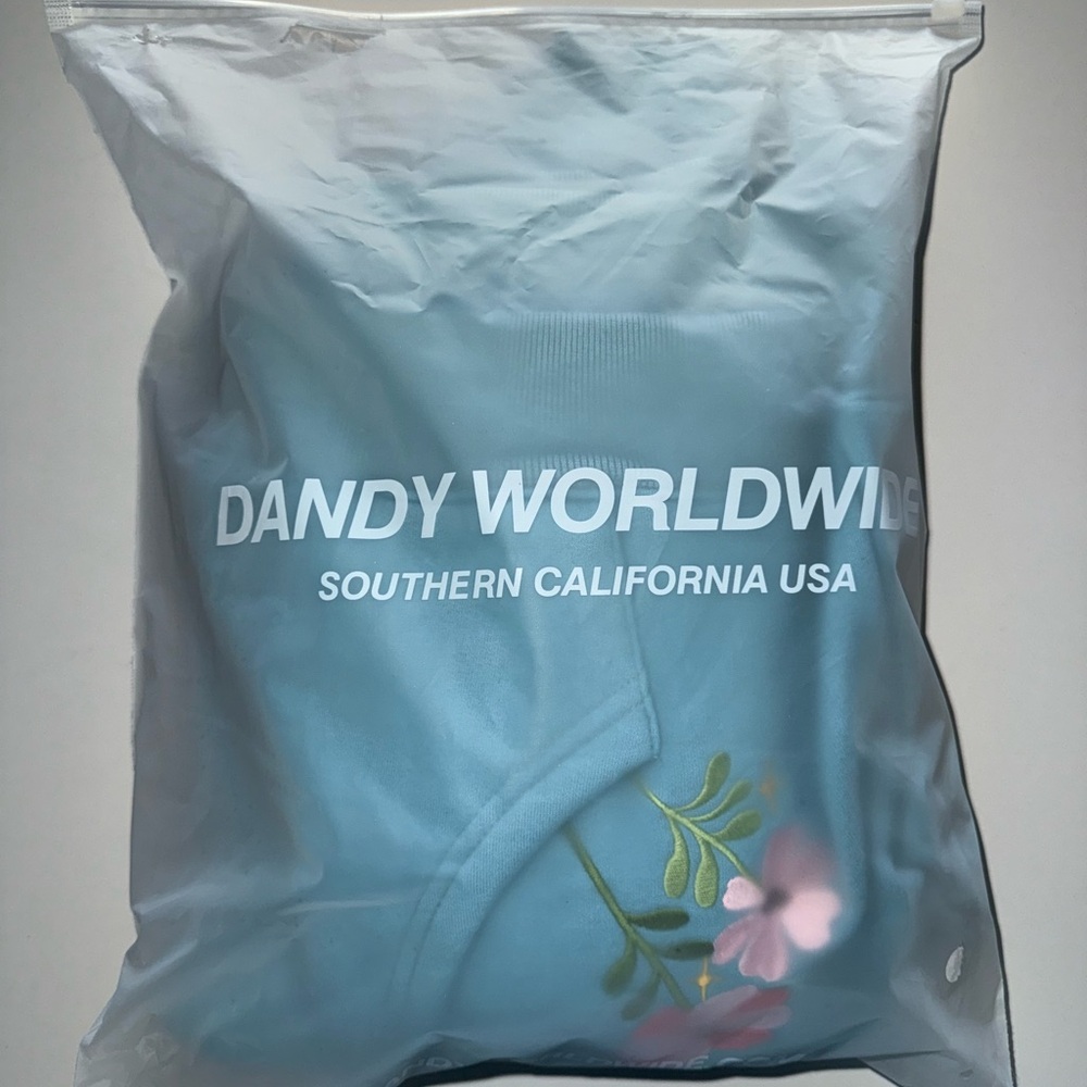 Dandy Worldwide Gift Giving sweatshirt.
